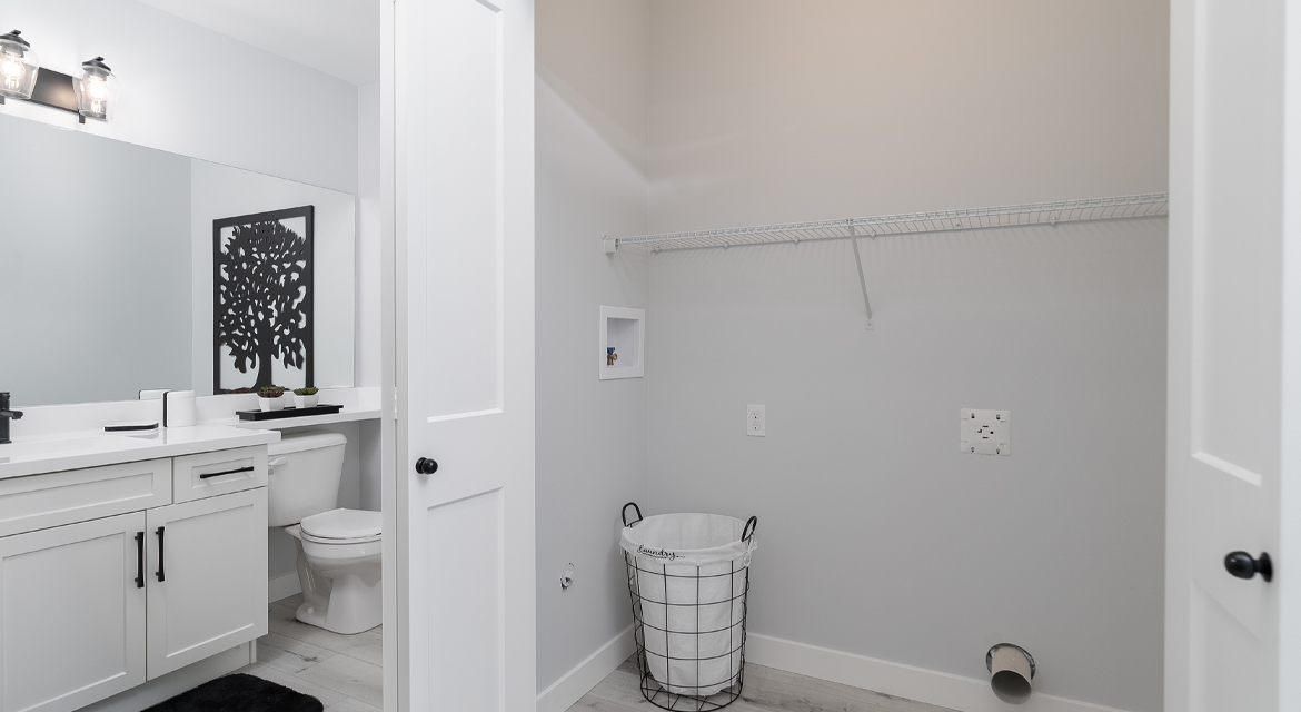 8. Powder Room and Laundry - 326 Tanager The Torres RG 106 D Broadview Homes Winnipeg