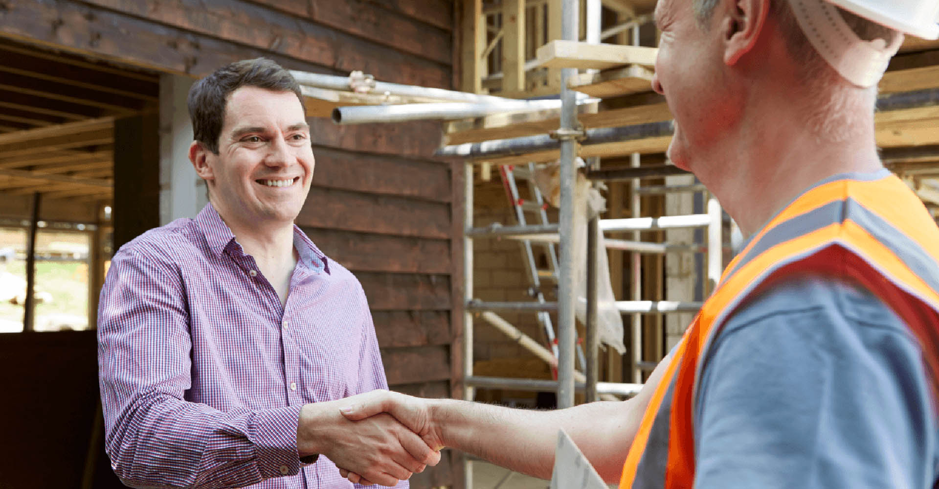 8 Questions to Ask a Builder Shaking Hands Image